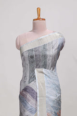 Grey kalamakri arttussar sareewith floral creeper prints zari border and dancing figures print pallu