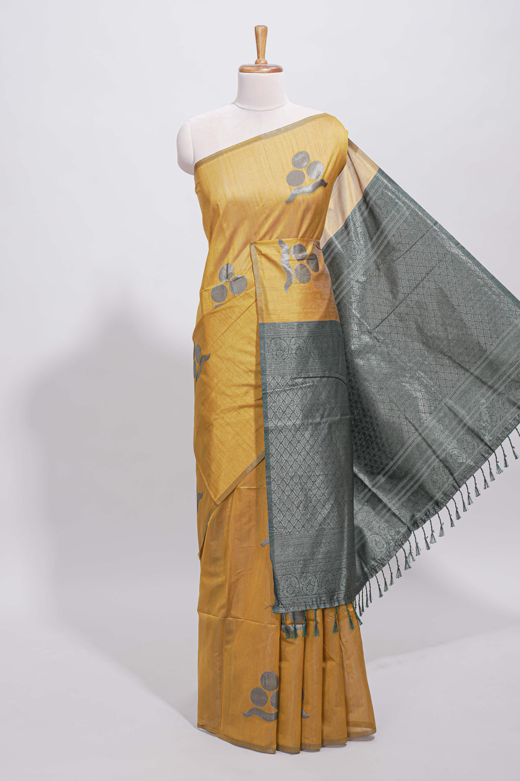 Borderless yellow round butta art tussar saree with contrast pallu and blouse