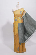 Borderless yellow round butta art tussar saree with contrast pallu and blouse