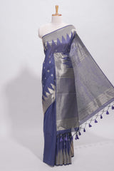 Blue ikkat style silver zari butta art tussar saree with self zari temple design border and matching blouse