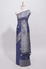Blue cow silver zari butta art tussar saree with self zari border and matching blouse