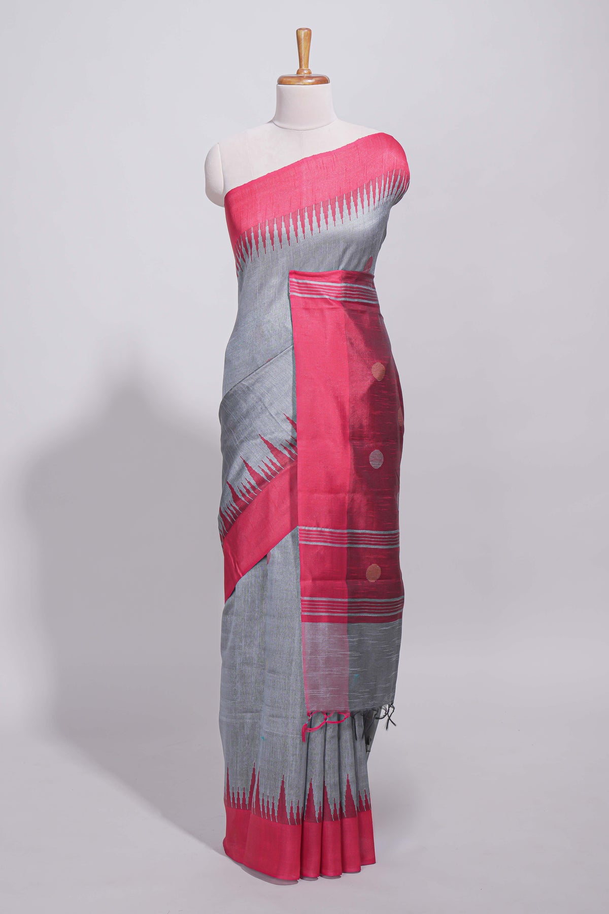 Grey plain art tussar saree with contrast border and striped pallu