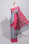 Grey plain art tussar saree with contrast border and striped pallu