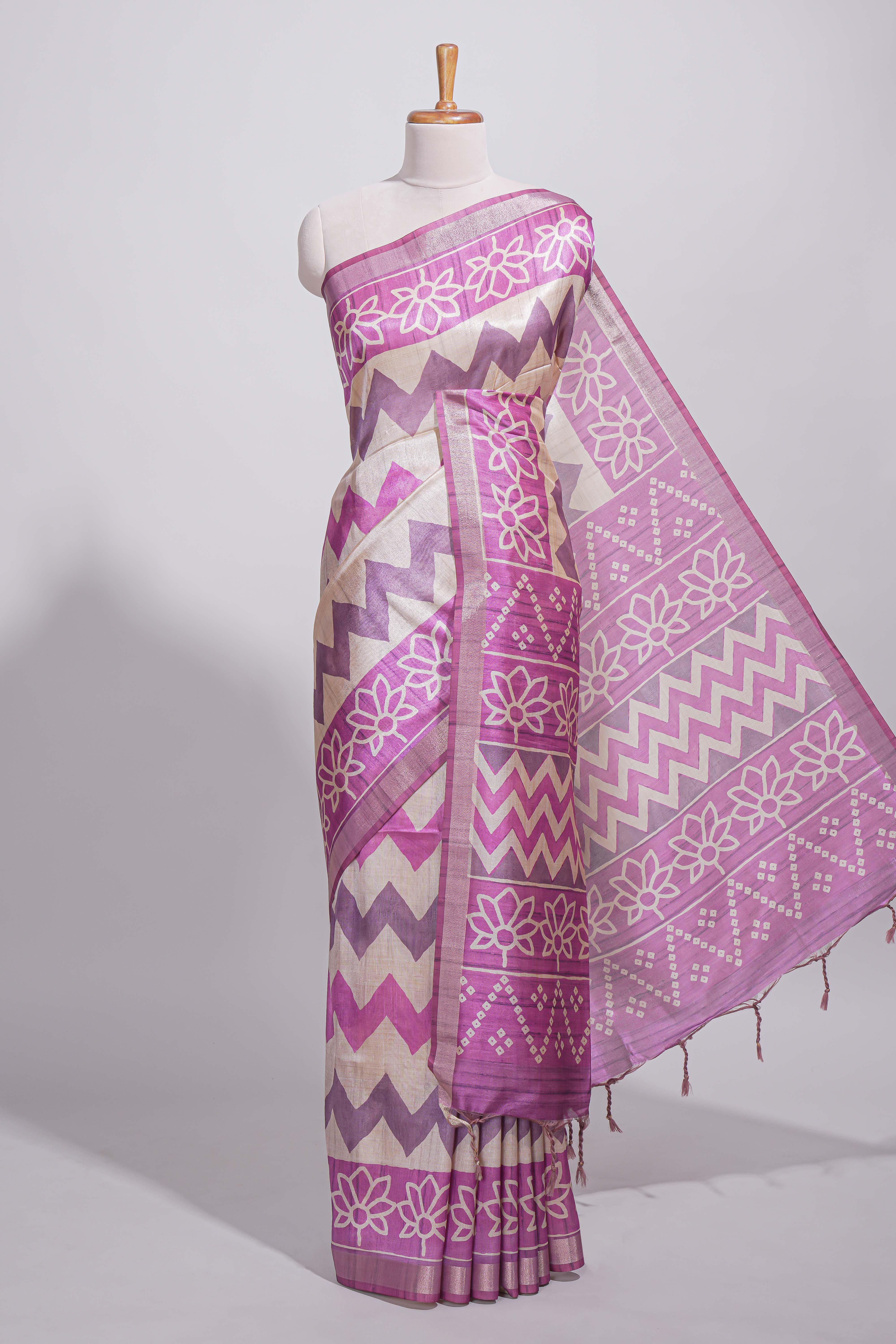 Purple color tussar saree body chevron prints floral motifs and printed pallu along with matching blouse