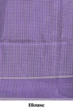 Pink tussar saree with woven checks by rich purple border and matching zari woven pallu with matching blouse piece
