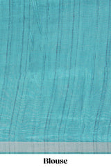 Turquoise color tussar saree body chevron prints floral motifs and printed pallu along with matching blouse