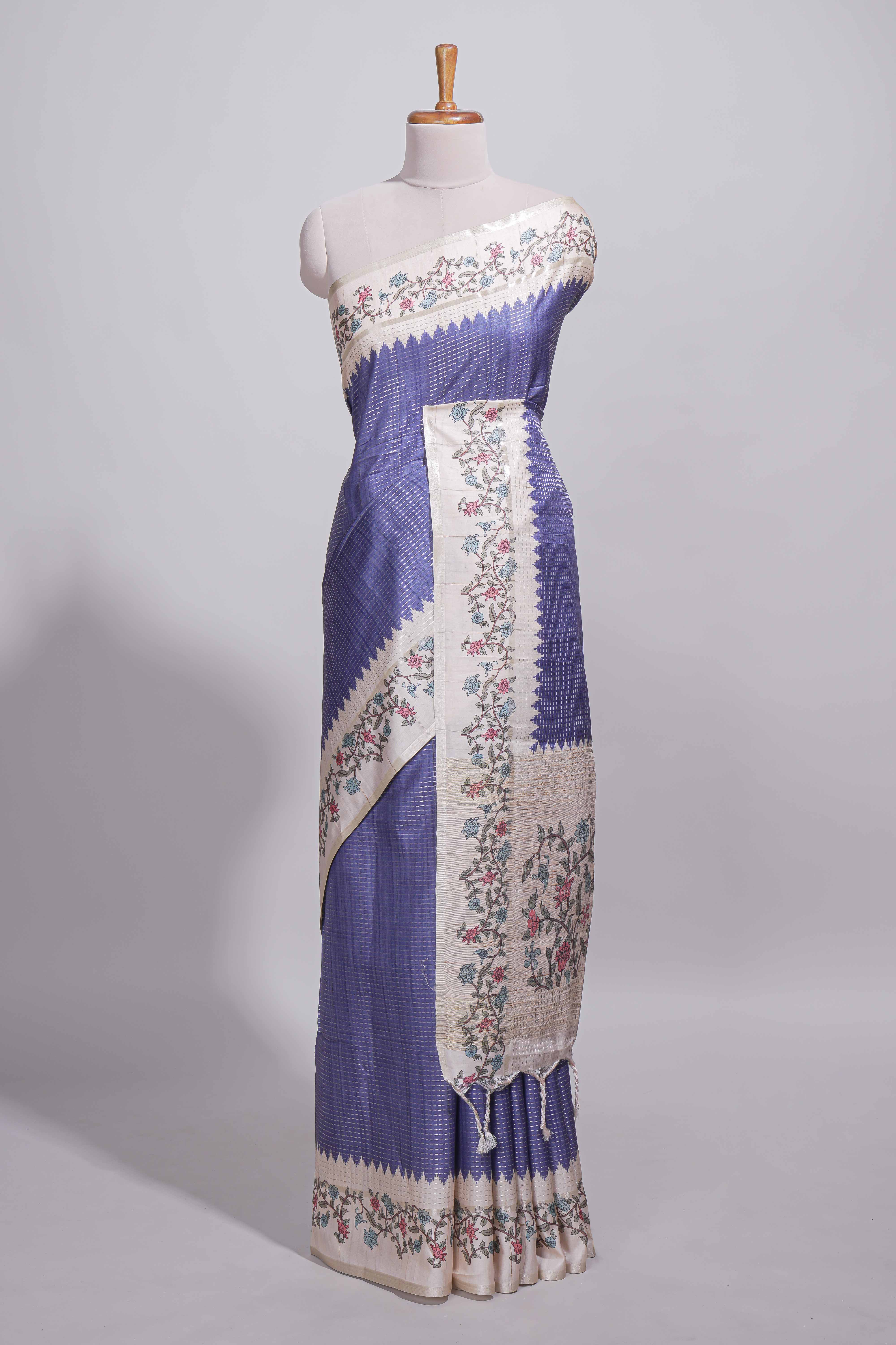 Royal blue tussar saree with woven checksfloral printed border andfloral printed palluwith blouse piece