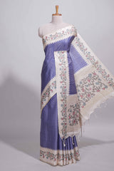 Royal blue tussar saree with woven checksfloral printed border andfloral printed palluwith blouse piece