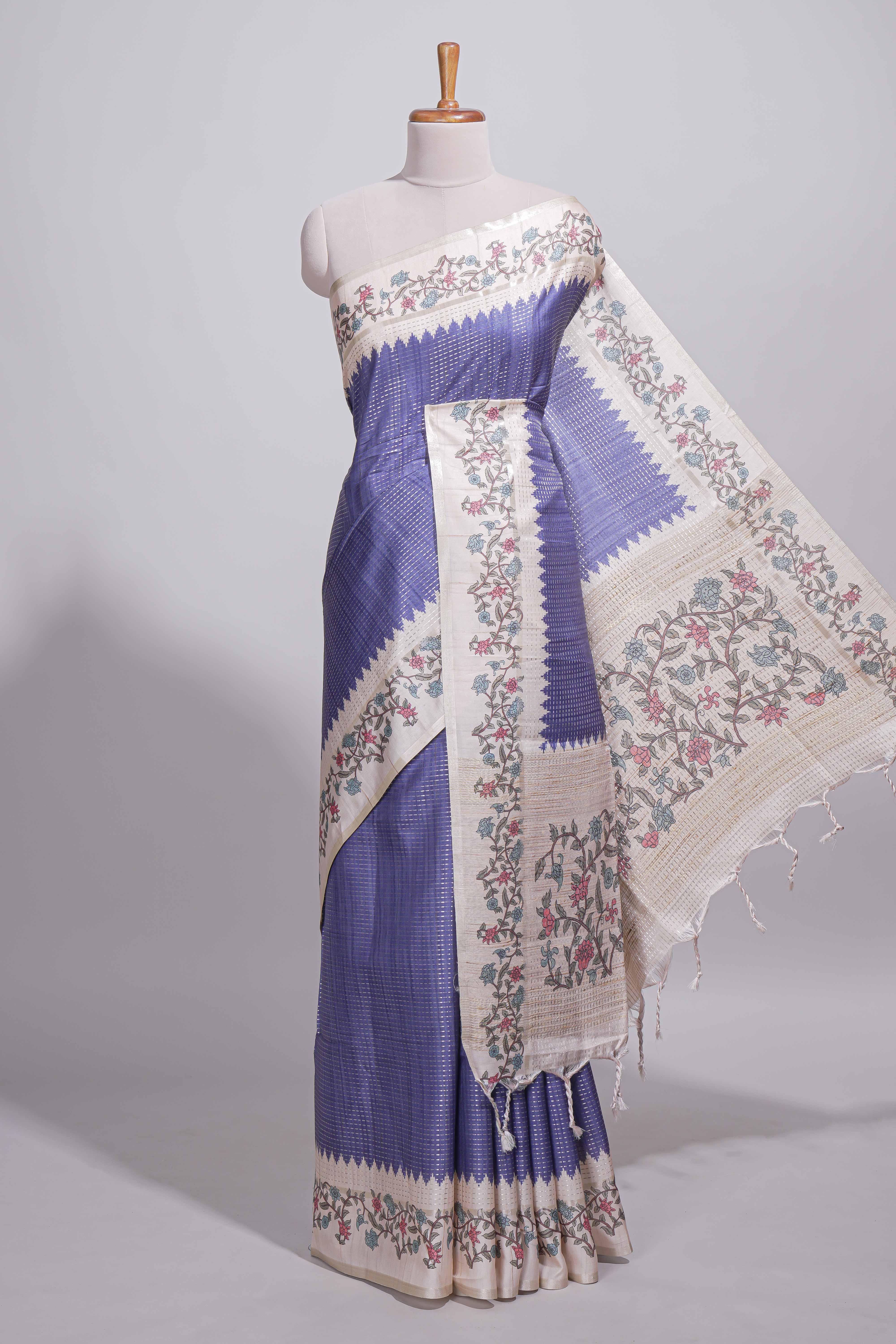 Royal blue tussar saree with woven checksfloral printed border andfloral printed palluwith blouse piece