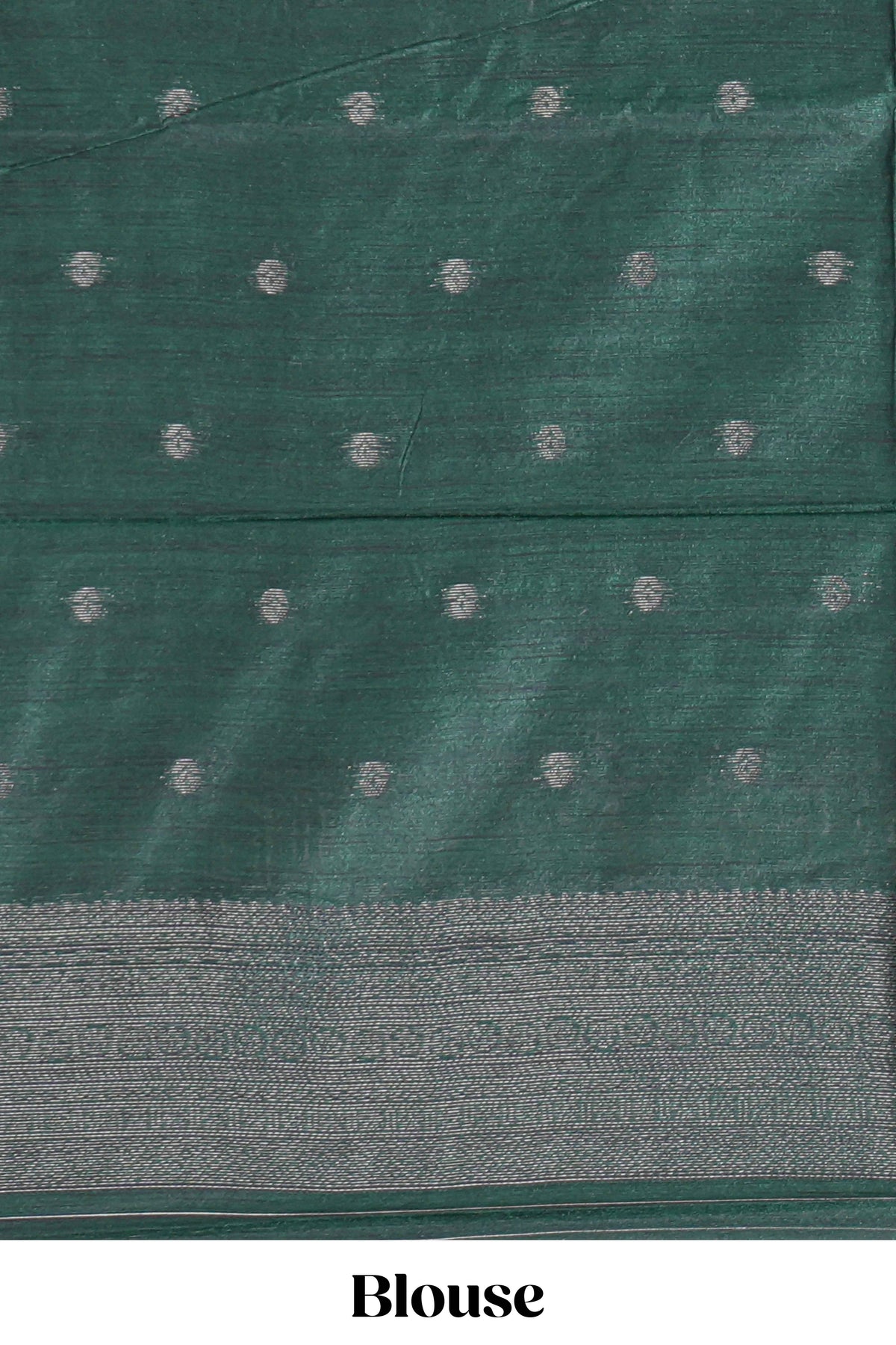 Mustard yellow tussar saree with subtle silver woven motifs paired with a rich zari pallu with tassels with contrast blouse piece