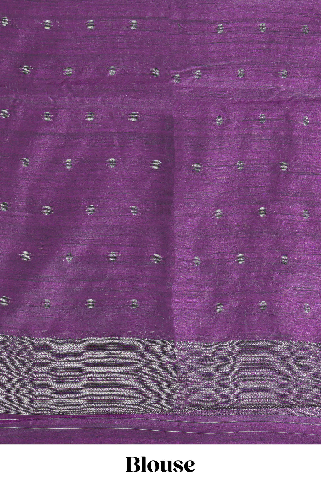 Royal blue tussar saree with subtle silver woven motifs paired with a rich zari pallu with tassels with contrast blouse piece