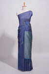 Navy blue tussar saree with subtle silver woven motifs paired with a rich zari pallu with tassels with contrast blouse piece