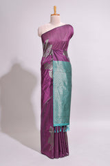 Borderless floral design purple art tussar saree with contrast pallu and silver motifs blouse