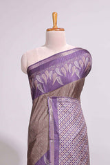 Dark beige geometric motifs art tussar saree with contrast border and striped blouse