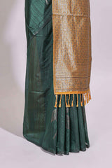 Borderless floral design green art tussar saree with contrast pallu and silver motifs blouse