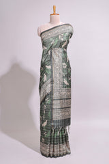 Forest green birds and floral design art tusser saree with contrast border and floral motifs blouse