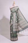 Forest green birds and floral design art tusser saree with contrast border and floral motifs blouse