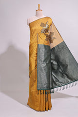 Borderless floral design mustard art tussar saree with contrast pallu and silver motifs blouse