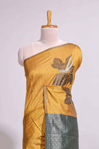 Borderless floral design mustard art tussar saree with contrast pallu and silver motifs blouse