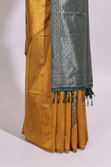 Borderless floral design mustard art tussar saree with contrast pallu and silver motifs blouse