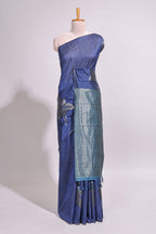 Borderless floral design blue art tussar saree with contrast pallu and silver motifs blouse