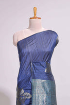 Borderless floral design blue art tussar saree with contrast pallu and silver motifs blouse