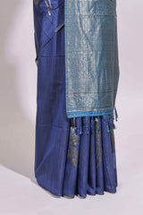 Borderless floral design blue art tussar saree with contrast pallu and silver motifs blouse