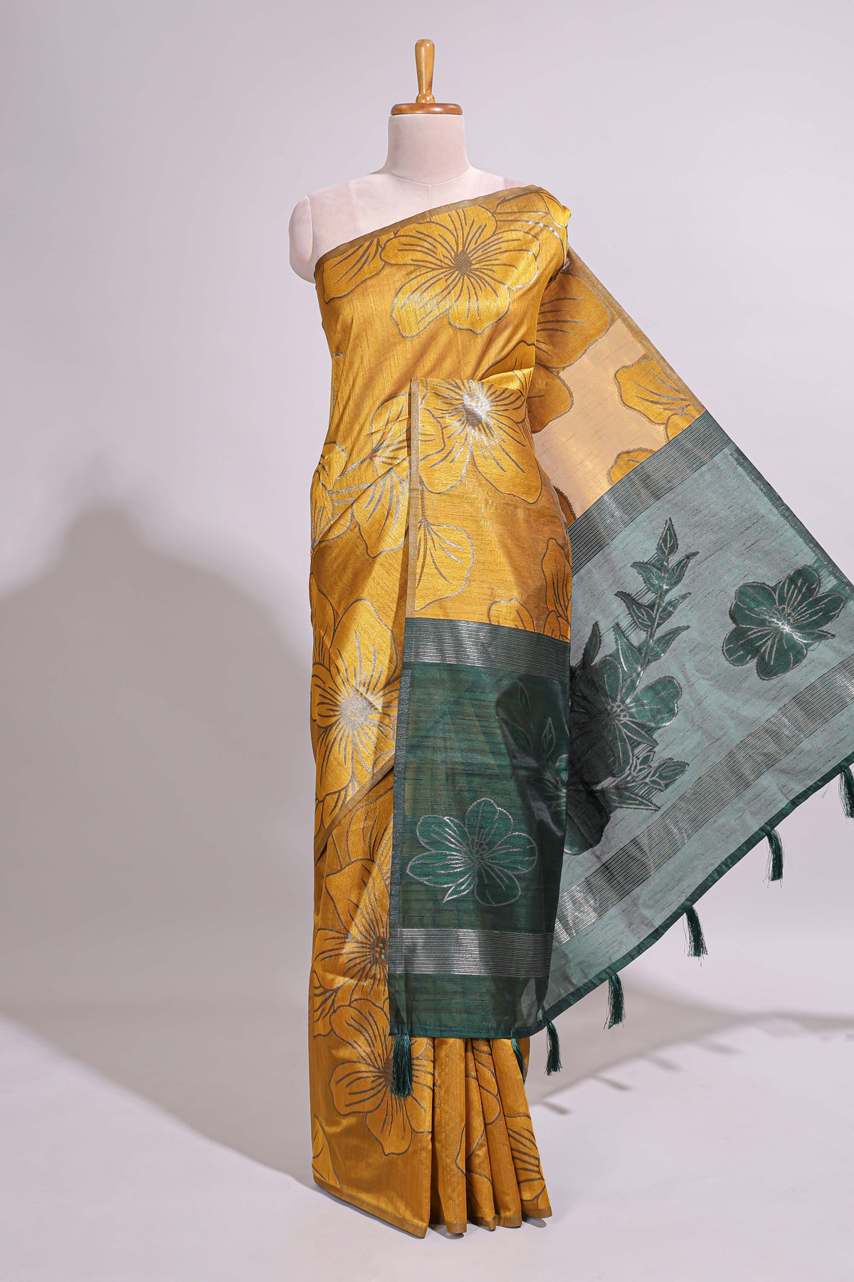 Borderless yellow floral design art tusser saree with contrast pallu and floral motifs blouse