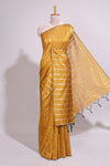 Mustard zari butta art tusser saree with self border and striped blouse