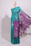Borderless green checked zari motifs art tussar saree with contrast floral design pallu and zari motifs blouse