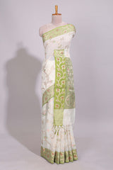 White floral design art tussar saree with contrast border and floral vine pallu