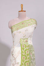 White floral design art tussar saree with contrast border and floral vine pallu