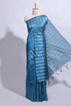 Blue zari butta art tussar saree with self border matching striped blouse