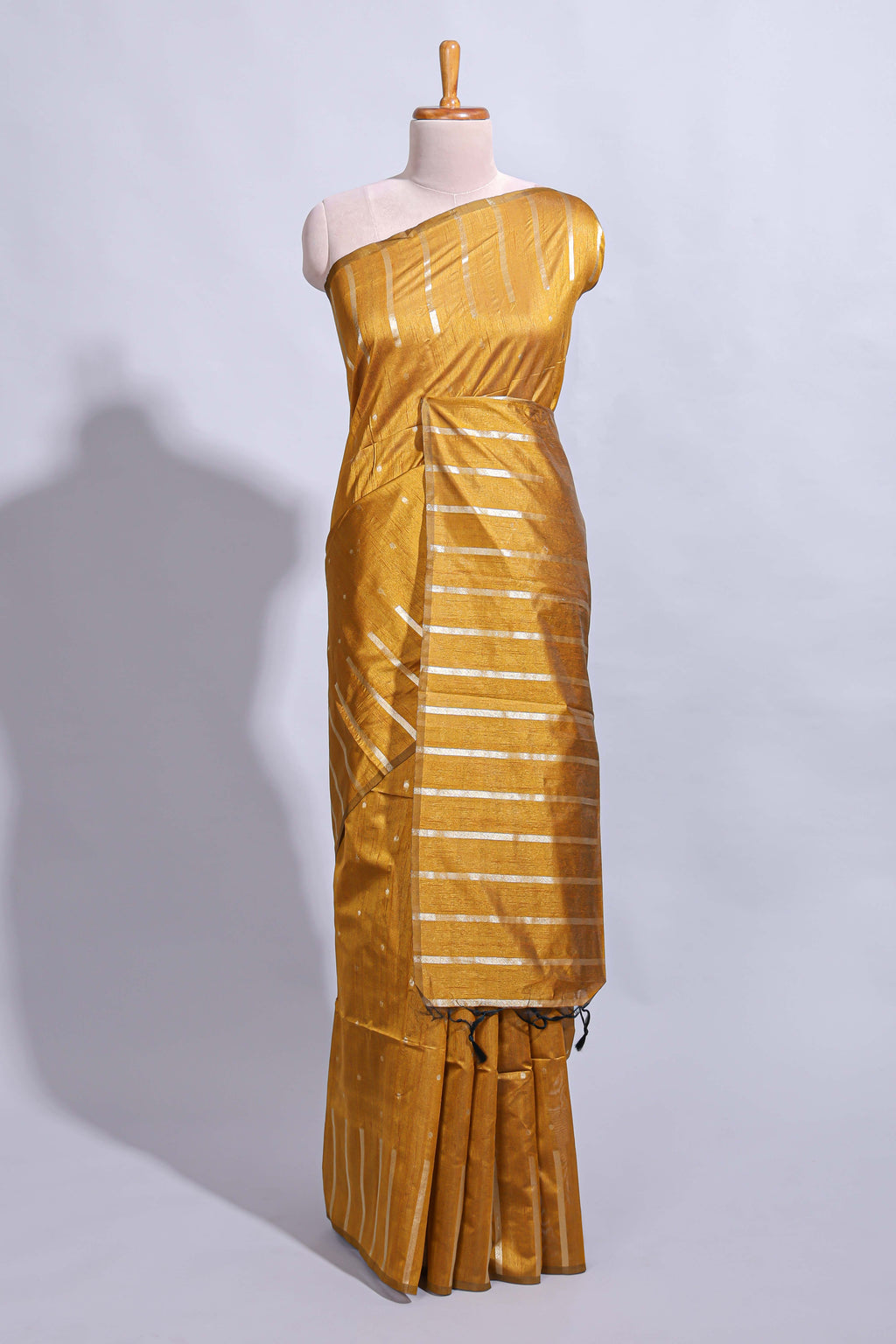 Mustard zari butta art tussar saree with self border matching striped blouse
