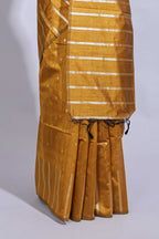 Mustard zari butta art tussar saree with self border matching striped blouse