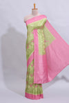 Green geometric design butta art tussar saree with contrast border and plain blouse
