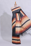 Black textured plain art tussar saree with contrast border and matching striped blouse