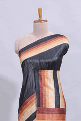 Black textured plain art tussar saree with contrast border and matching striped blouse