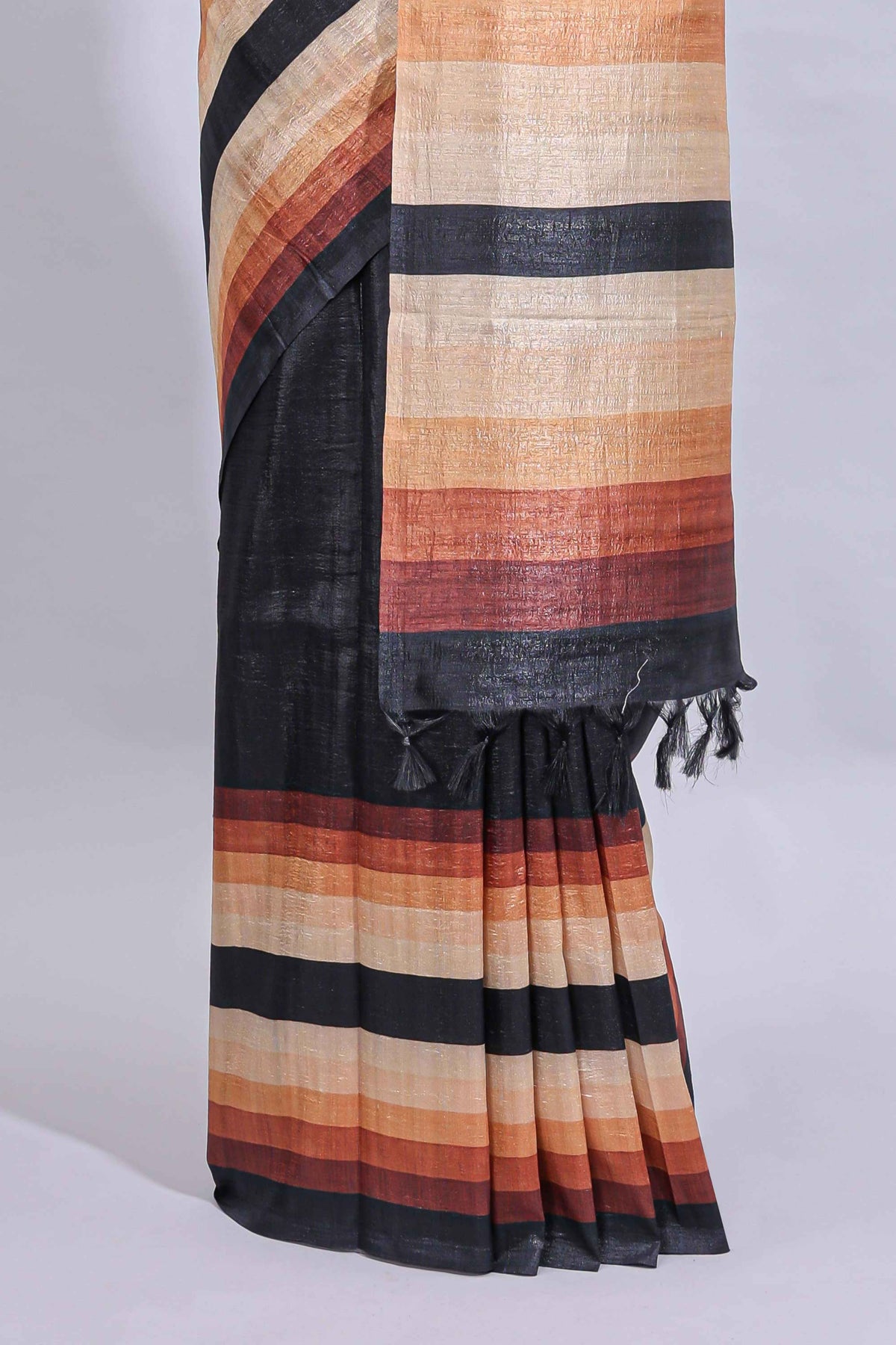 Black textured plain art tussar saree with contrast border and matching striped blouse