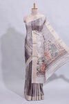 Grey kalamkari style floral design art tussar saree with contrast border and matching striped blouse