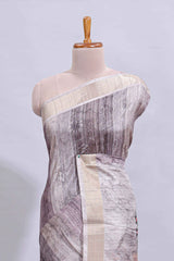 Grey kalamkari style floral design art tussar saree with contrast border and matching striped blouse
