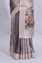 Grey kalamkari style floral design art tussar saree with contrast border and matching striped blouse