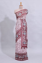 Pale pink floral design art tussar saree with contrast border and matching motifs blouse