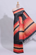 Black textured plain art tussar saree with contrast orange border and matching striped blouse