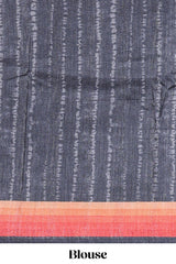 Black textured plain art tussar saree with contrast orange border and matching striped blouse