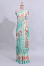 Blue floral design art tussar saree with self zari border and matching printed blouse