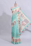 Blue floral design art tussar saree with self zari border and matching printed blouse