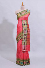 Pink plain art tussar saree with contrast ikkat style border and floral design striped pallu
