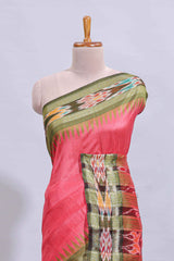 Pink plain art tussar saree with contrast ikkat style border and floral design striped pallu