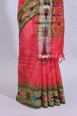 Pink plain art tussar saree with contrast ikkat style border and floral design striped pallu